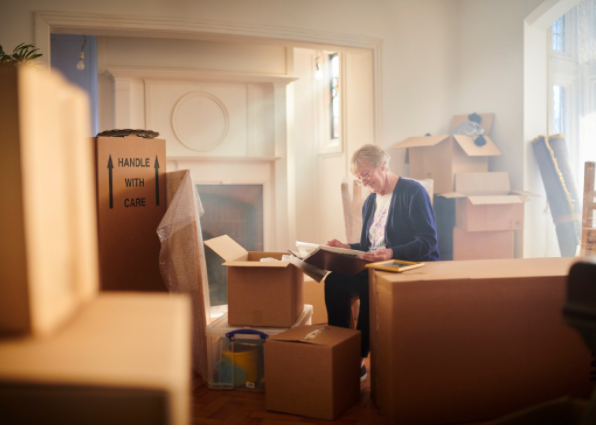 Woman with boxes to pack