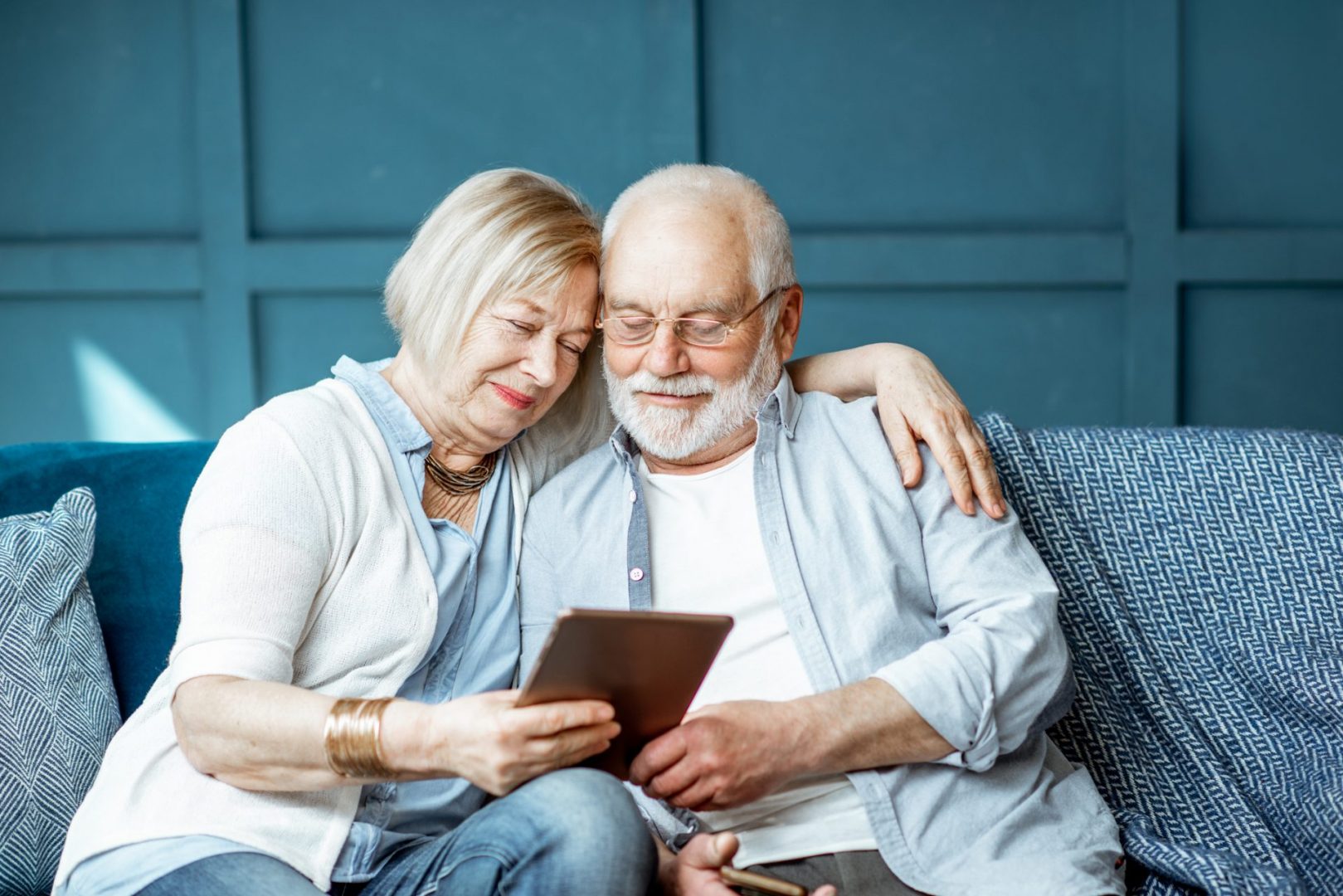 couple looking at a tablet together