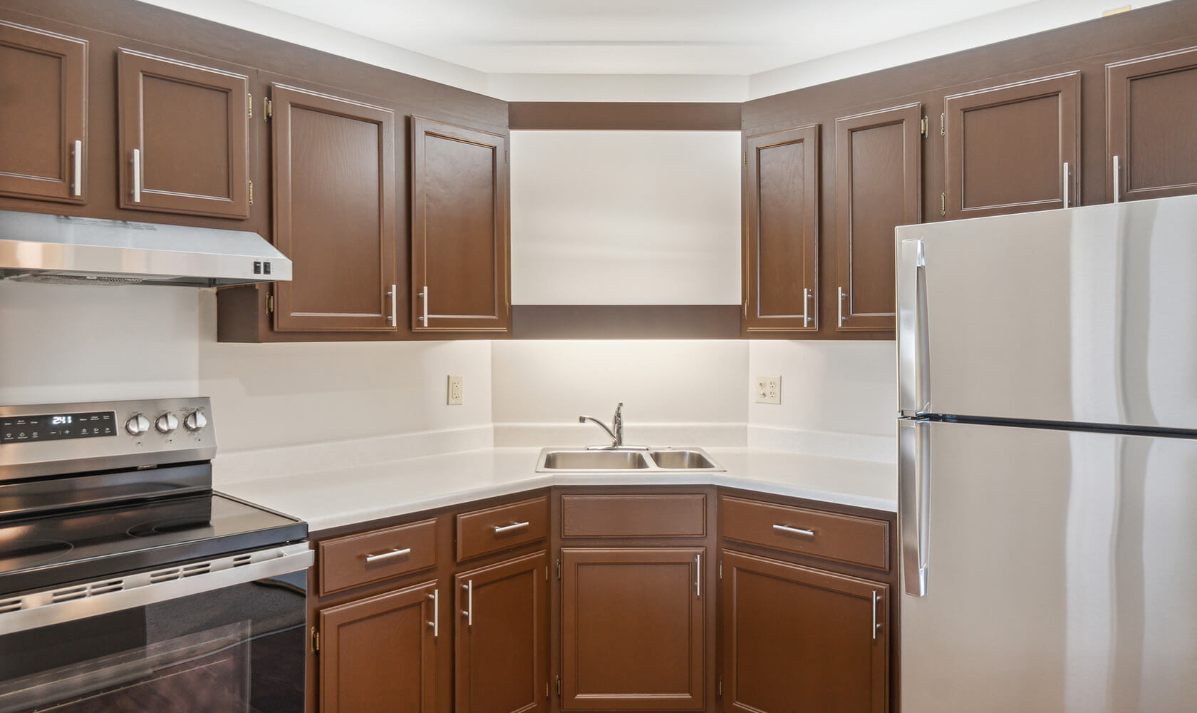 Concord kitchen with dark brown cabinets