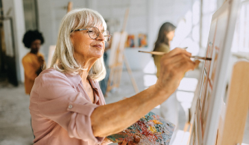 senior woman painting