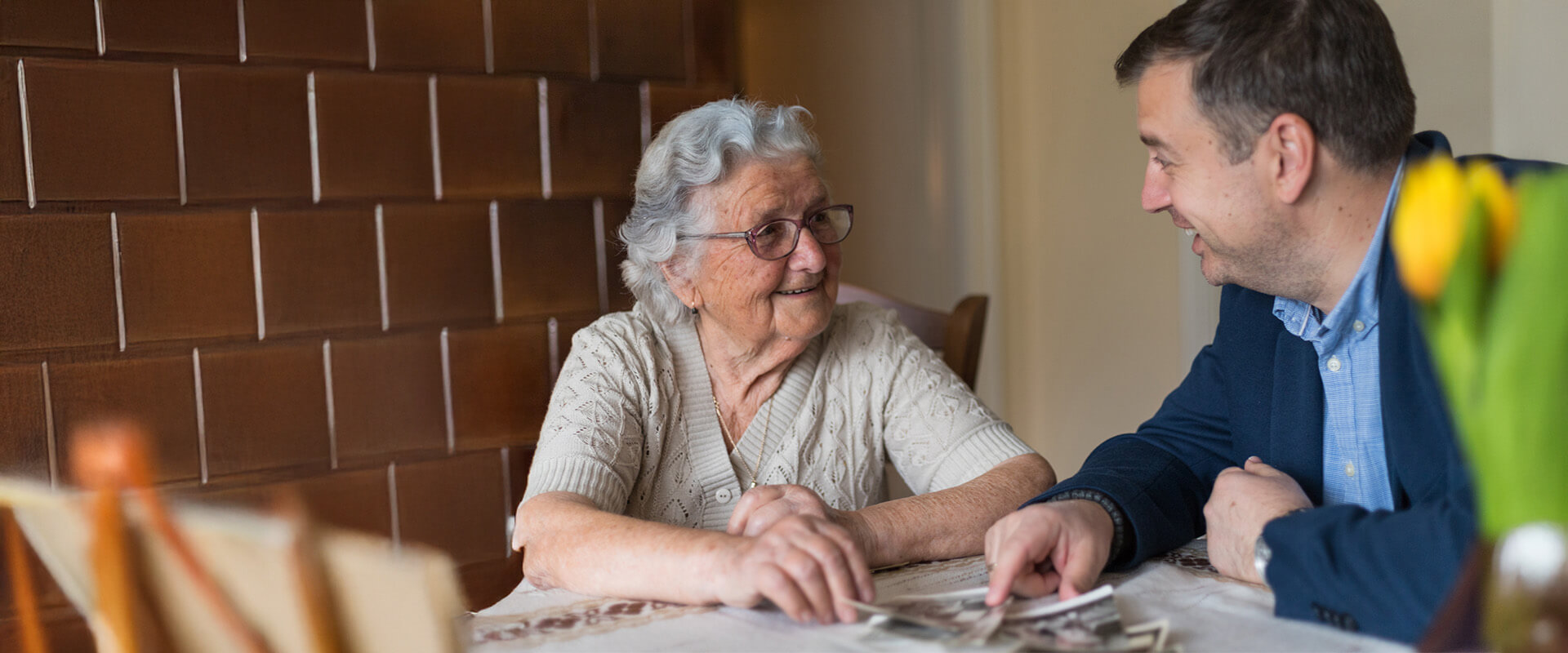 Senior woman discussing with professional
